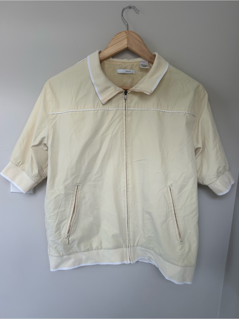 Lizgolf butter yellow Short-Sleeve Zip Jacket by (no brand visible)